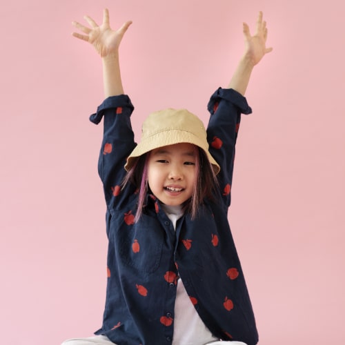 asian-girl-posing-with-arms-up-min