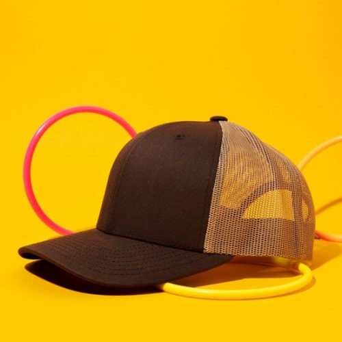 creative-trucker-hat-still-life_23-2149504578-min