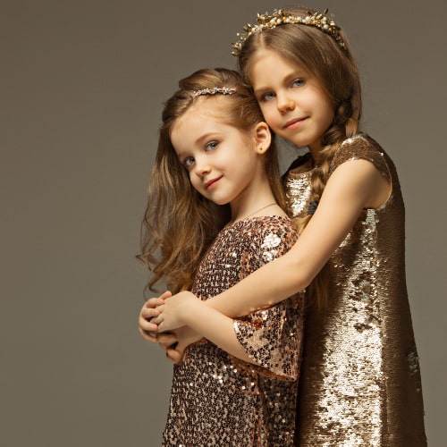 fashion-portrait-young-beautiful-teen-girls-gold-dress-beauty-fashion-glowing-make-up-shinning-concepts-caucasian-models-min